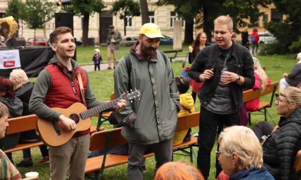 The Shots Playing Guitar Outdoors